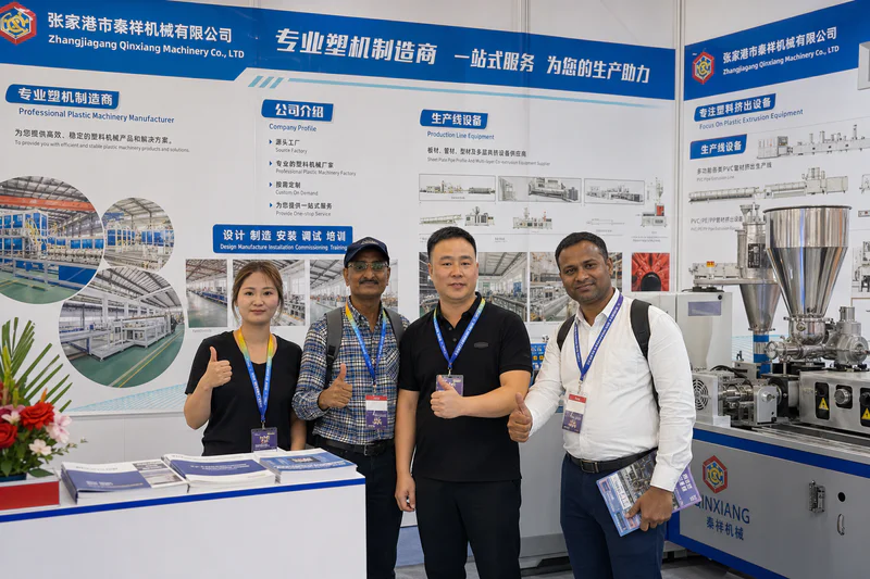 QTech Machinery exhibition stand with extrusion equipment on display
