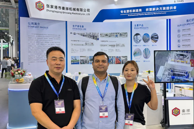 QTech Machinery team meeting buyers at a trade show