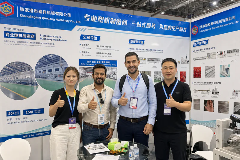 QTech Machinery at an international plastics exhibition, booth one