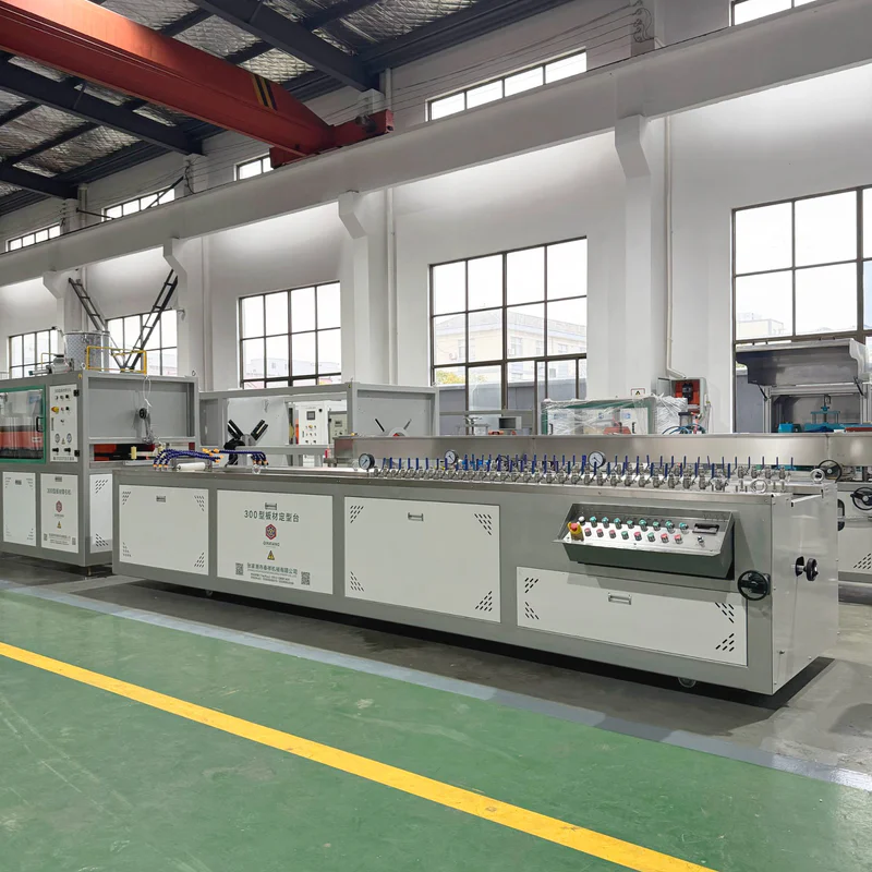 Calibration and cooling section of a board extrusion line