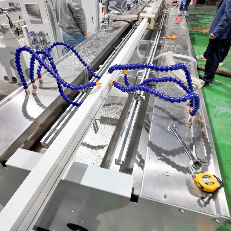 Plastic extrusion machine for manufacturing plastic pipes and profiles in a showroom scene