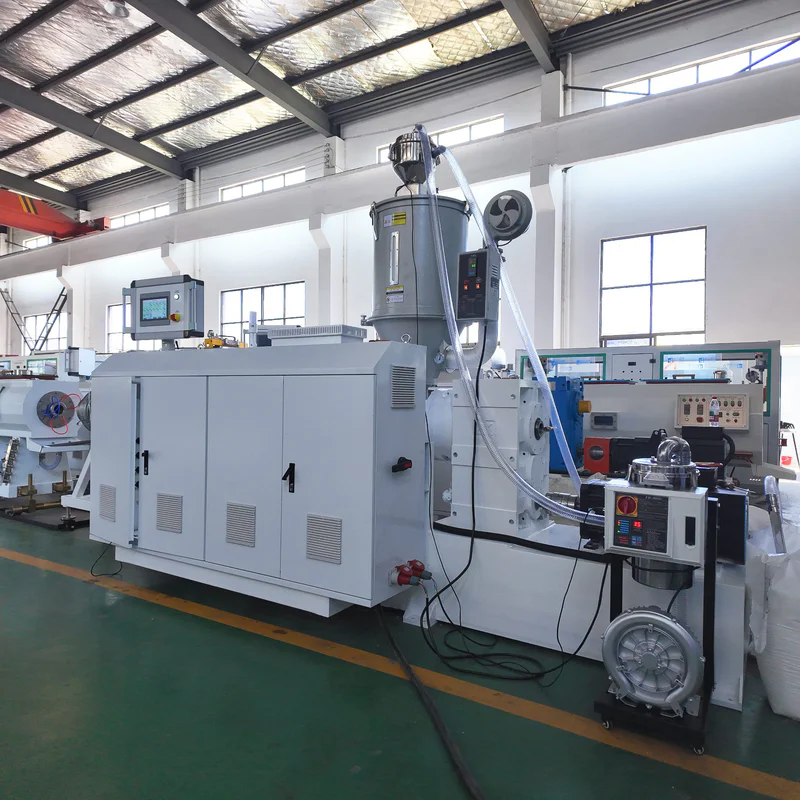 Plastic extrusion machine for core tube, pipe, and profile production in a factory setting