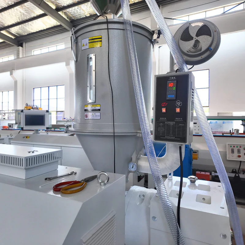 Plastic extrusion machine with hopper for core tube extruder in showroom scene