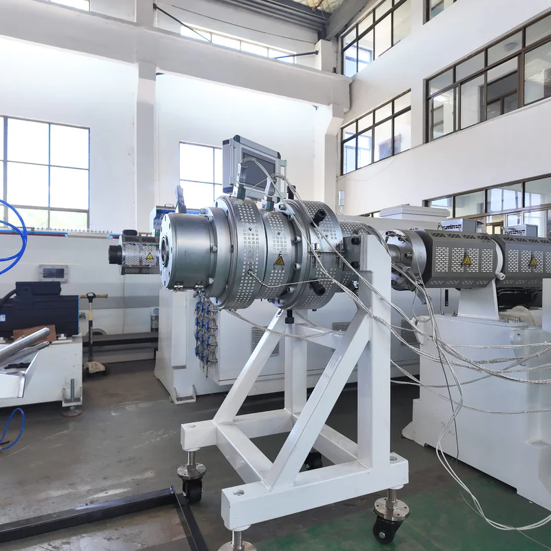 Plastic extrusion machine for manufacturing plastic pipes and profiles in a production setting