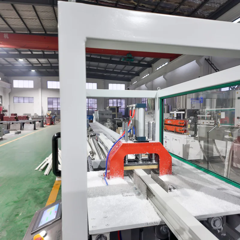 Cutting machine for PVC profile extrusion line in plastic extrusion workshop