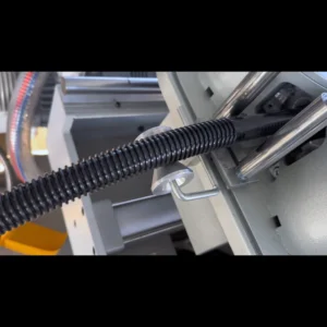 Plastic extrusion machine for manufacturing plastic pipes and profiles in a showroom setting