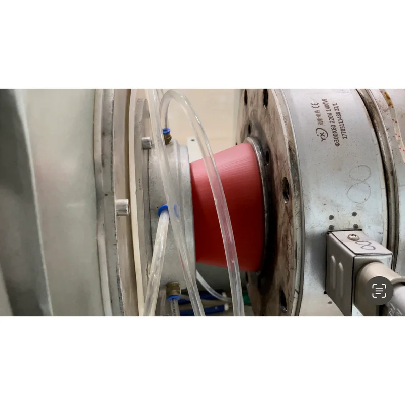 Plastic extrusion machine for manufacturing plastic pipes and profiles in a showroom scene