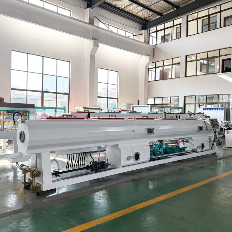 Plastic extrusion machine for manufacturing plastic pipes and profiles in a factory setting