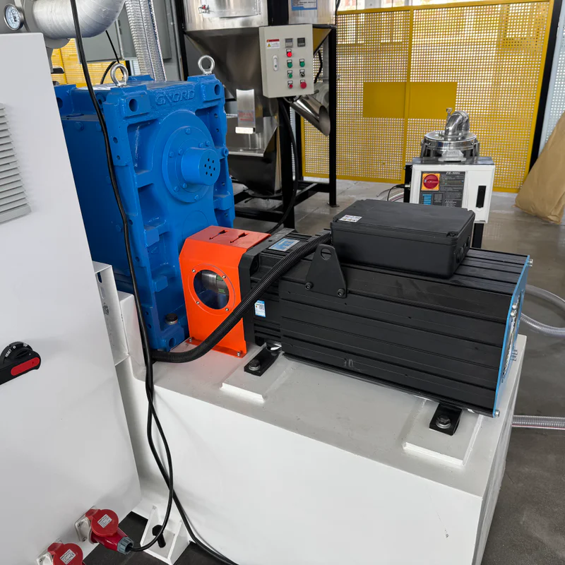 Plastic extrusion machine for pipe and profile production in showroom scene