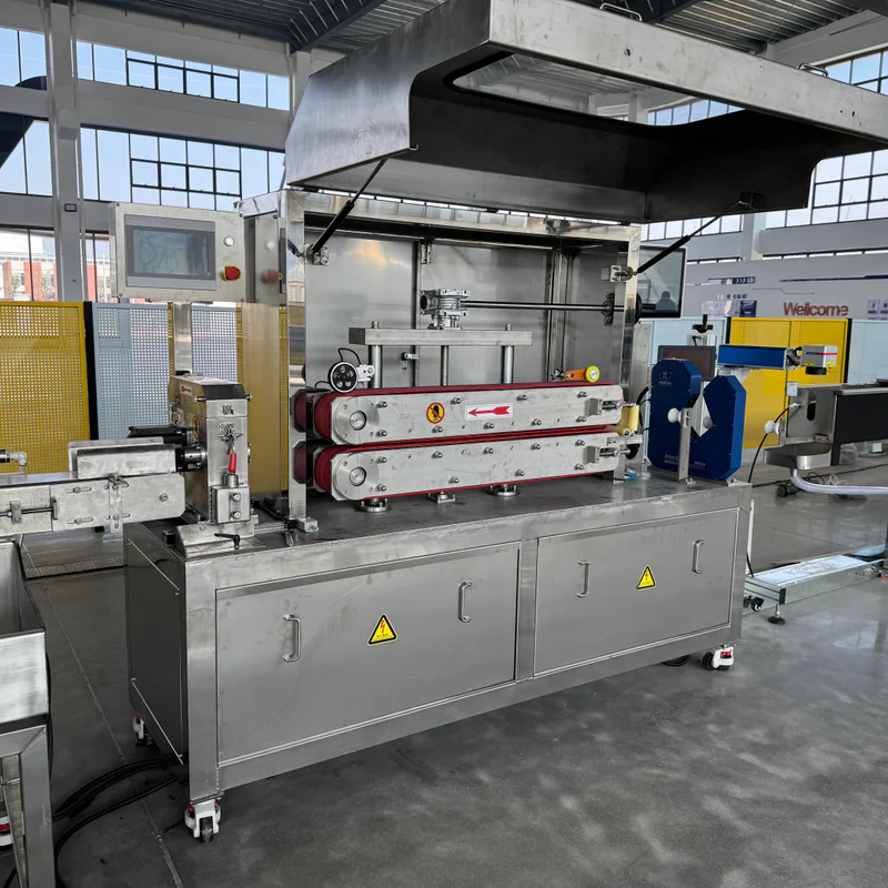 Plastic extrusion machine for pipe and profile production in factory setting