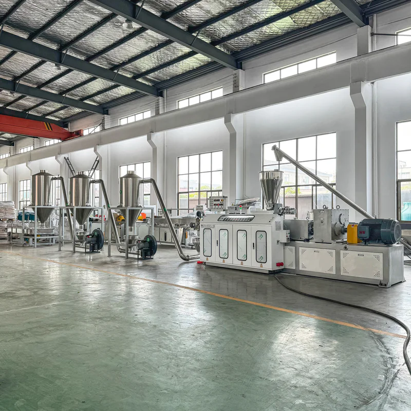 Plastic extrusion machine for pipe and profile production in factory setting
