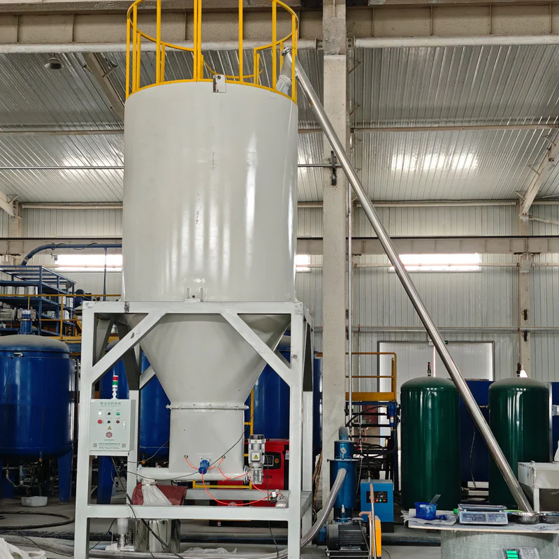 Plastic extrusion machine for PVC pipe and profile production with silo in showroom background