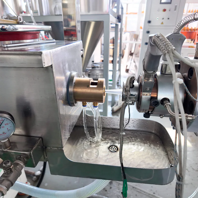 Plastic extrusion machine for manufacturing plastic pipes and profiles
