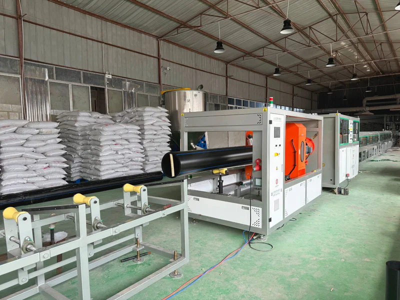 Plastic extrusion machine for manufacturing plastic pipes and profiles in a showroom scene