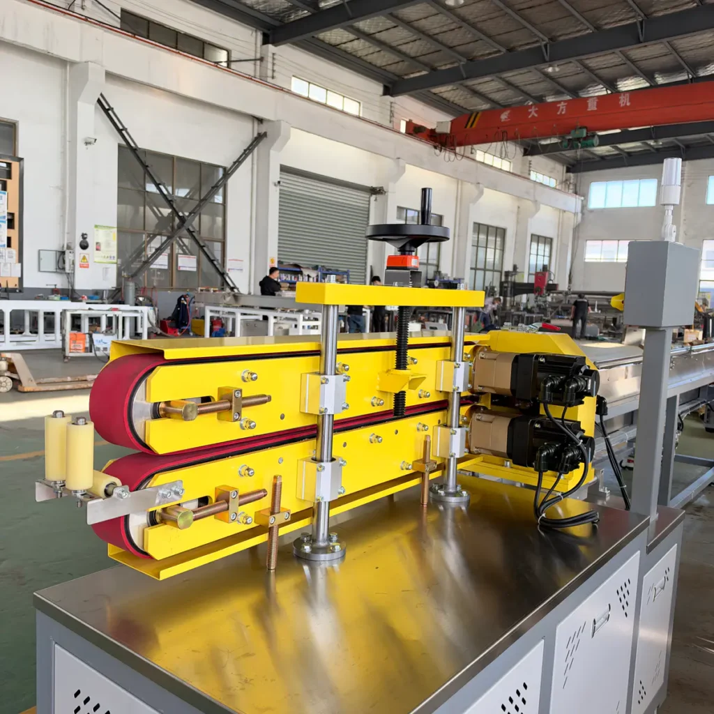 Plastic extrusion machine for plastic pipe and profile production in factory setting