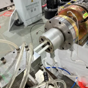 Plastic extrusion machine for PVC decorative profile and pipe production, showroom background