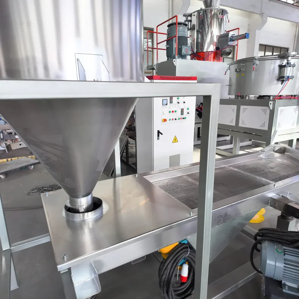 Plastic extrusion machine for manufacturing plastic pipes and profiles in factory setting
