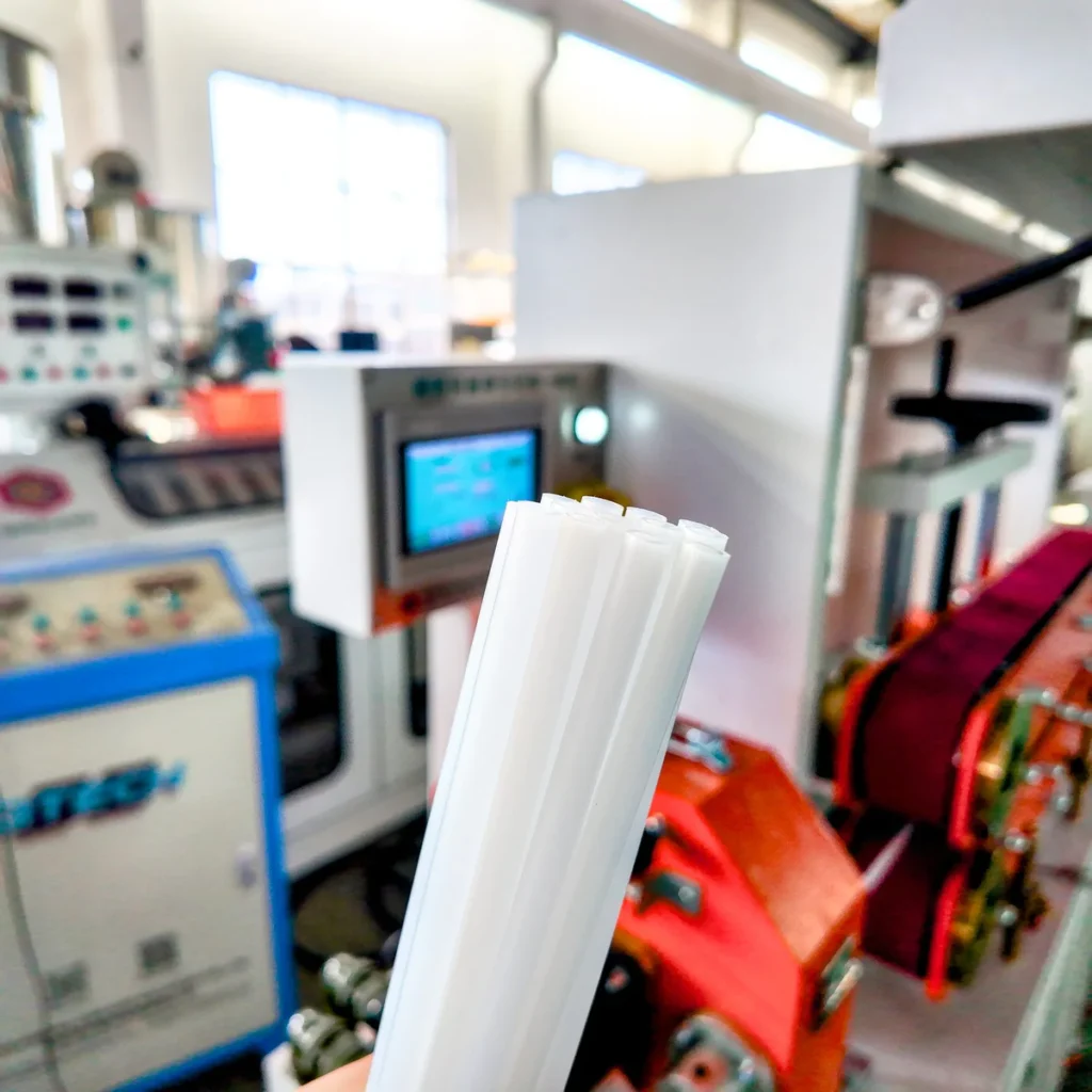 Plastic extrusion machine for pipe and profile manufacturing in showroom scene